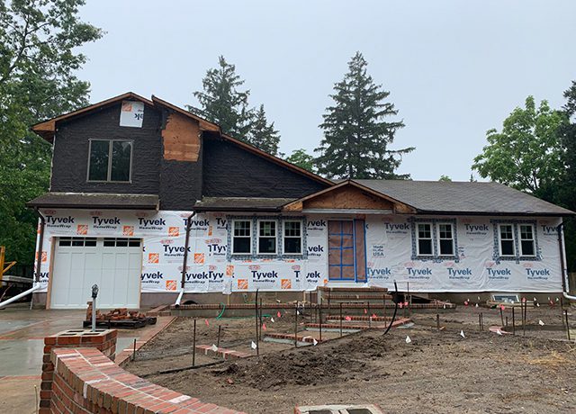 House under construction with Tyvek wrap.